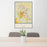 24x36 College Station Texas Map Print Portrait Orientation in Woodblock Style Behind 2 Chairs Table and Potted Plant