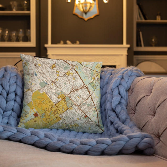 Custom College Station Texas Map Throw Pillow in Woodblock on Cream Colored Couch