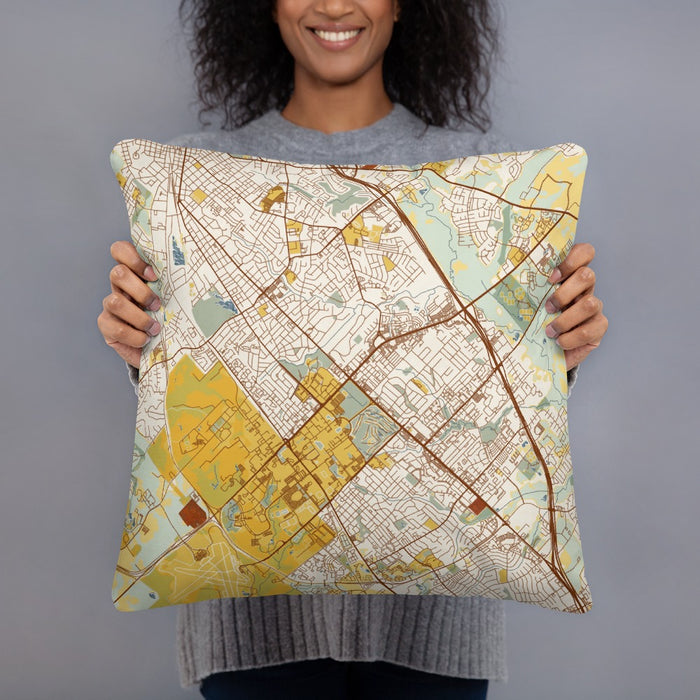 Person holding 18x18 Custom College Station Texas Map Throw Pillow in Woodblock