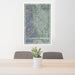 24x36 Colorado Springs Colorado Map Print Portrait Orientation in Afternoon Style Behind 2 Chairs Table and Potted Plant