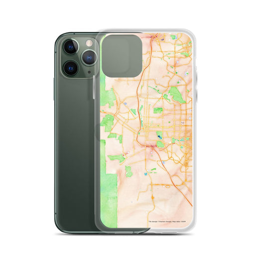 Custom Colorado Springs Colorado Map Phone Case in Watercolor on Table with Laptop and Plant