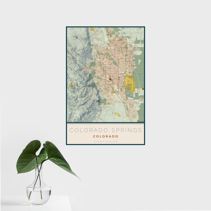 16x24 Colorado Springs Colorado Map Print Portrait Orientation in Woodblock Style With Tropical Plant Leaves in Water