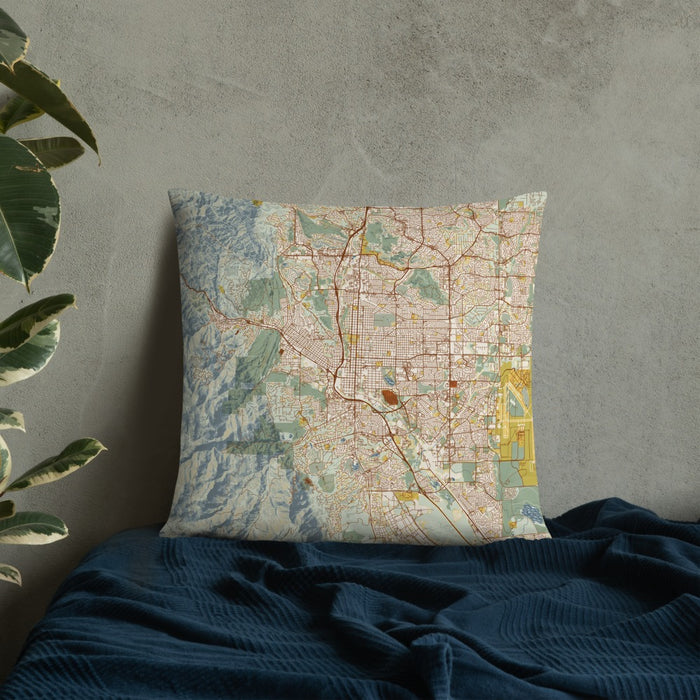 Custom Colorado Springs Colorado Map Throw Pillow in Woodblock on Bedding Against Wall