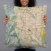 Person holding 22x22 Custom Colorado Springs Colorado Map Throw Pillow in Woodblock
