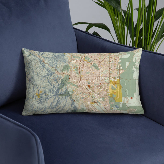 Custom Colorado Springs Colorado Map Throw Pillow in Woodblock on Blue Colored Chair