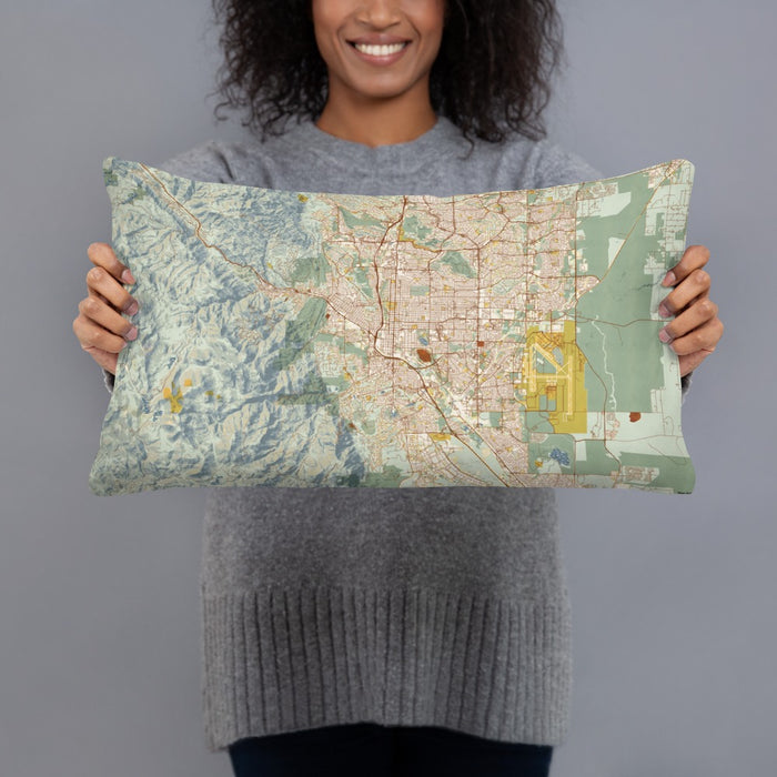 Person holding 20x12 Custom Colorado Springs Colorado Map Throw Pillow in Woodblock