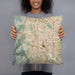 Person holding 18x18 Custom Colorado Springs Colorado Map Throw Pillow in Woodblock