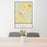 24x36 Colquitt Georgia Map Print Portrait Orientation in Woodblock Style Behind 2 Chairs Table and Potted Plant