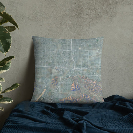Custom Colton California Map Throw Pillow in Afternoon on Bedding Against Wall
