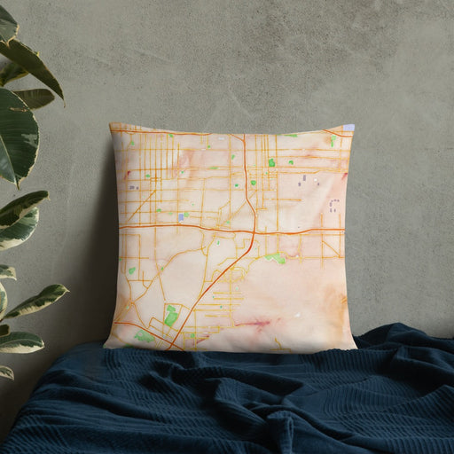 Custom Colton California Map Throw Pillow in Watercolor on Bedding Against Wall