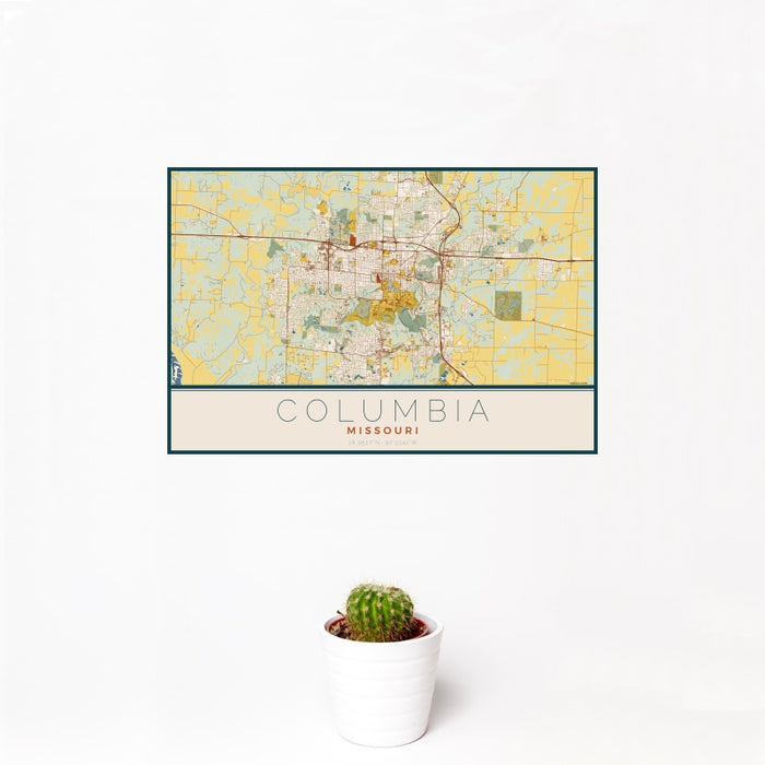 12x18 Columbia Missouri Map Print Landscape Orientation in Woodblock Style With Small Cactus Plant in White Planter