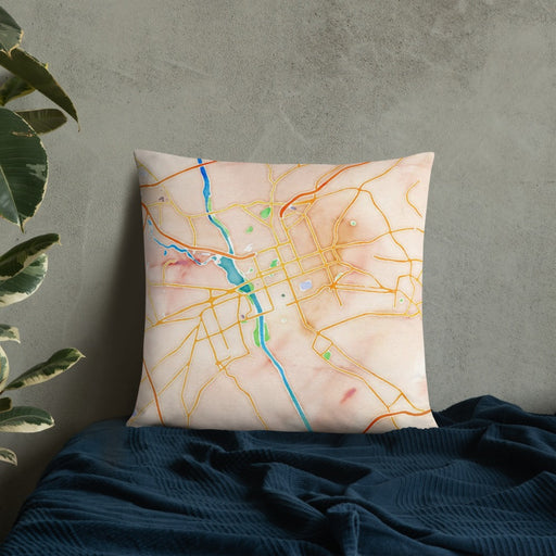 Custom Columbia South Carolina Map Throw Pillow in Watercolor on Bedding Against Wall