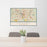 24x36 Columbia South Carolina Map Print Landscape Orientation in Woodblock Style Behind 2 Chairs Table and Potted Plant
