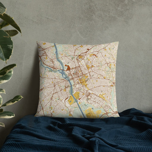 Custom Columbia South Carolina Map Throw Pillow in Woodblock on Bedding Against Wall