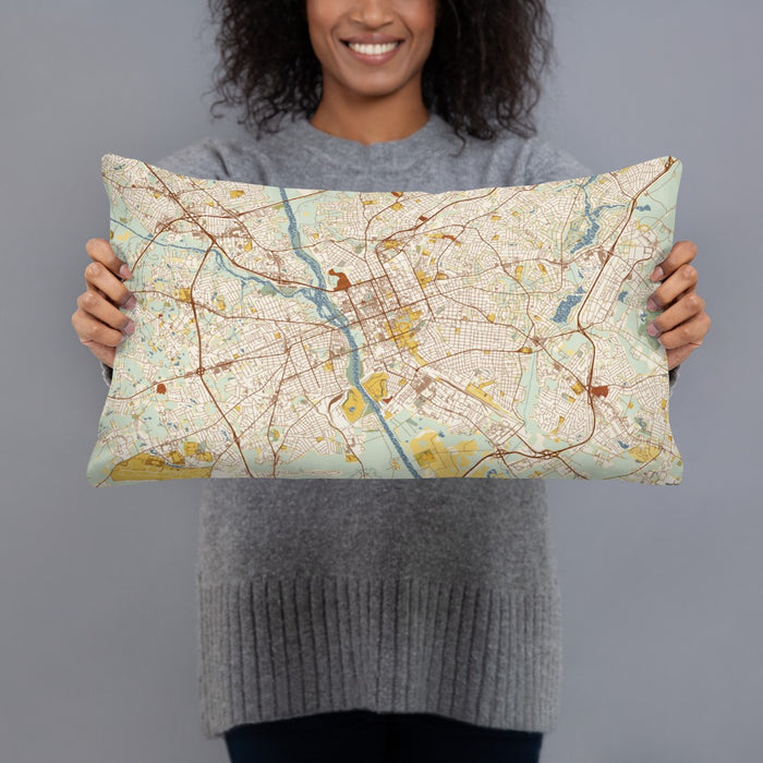 Person holding 20x12 Custom Columbia South Carolina Map Throw Pillow in Woodblock