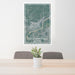 24x36 Columbia Falls Montana Map Print Portrait Orientation in Afternoon Style Behind 2 Chairs Table and Potted Plant