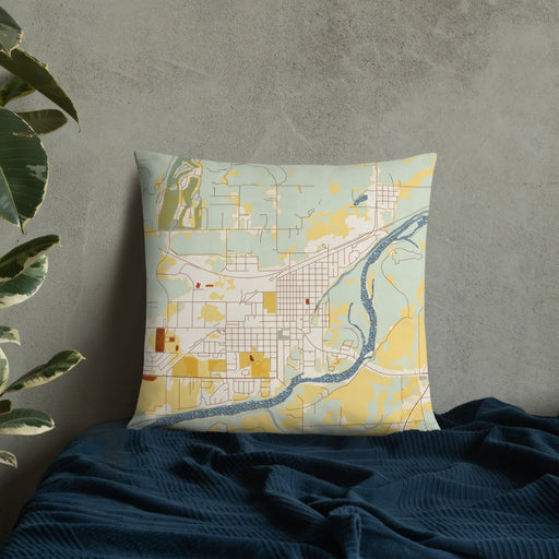 Custom Columbia Falls Montana Map Throw Pillow in Woodblock on Bedding Against Wall