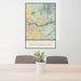 24x36 Columbia River Gorge National Scenic Area Map Print Portrait Orientation in Woodblock Style Behind 2 Chairs Table and Potted Plant