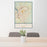 24x36 Columbus Georgia Map Print Portrait Orientation in Woodblock Style Behind 2 Chairs Table and Potted Plant