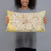 Person holding 20x12 Custom Columbus Ohio Map Throw Pillow in Woodblock