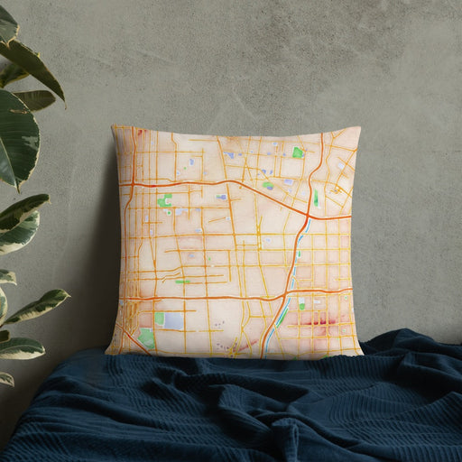 Custom Compton California Map Throw Pillow in Watercolor on Bedding Against Wall