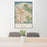 24x36 Concord California Map Print Portrait Orientation in Woodblock Style Behind 2 Chairs Table and Potted Plant