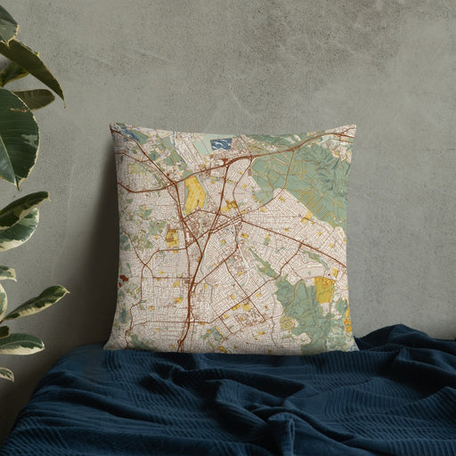Custom Concord California Map Throw Pillow in Woodblock on Bedding Against Wall