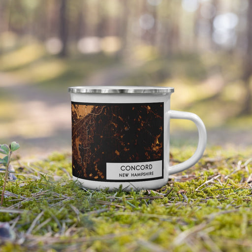 Right View Custom Concord New Hampshire Map Enamel Mug in Ember on Grass With Trees in Background