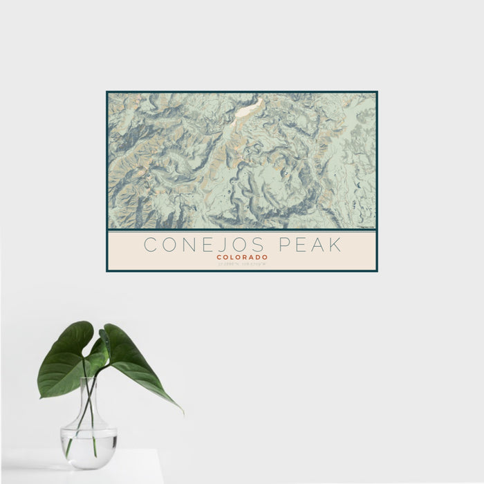 16x24 Conejos Peak Colorado Map Print Landscape Orientation in Woodblock Style With Tropical Plant Leaves in Water