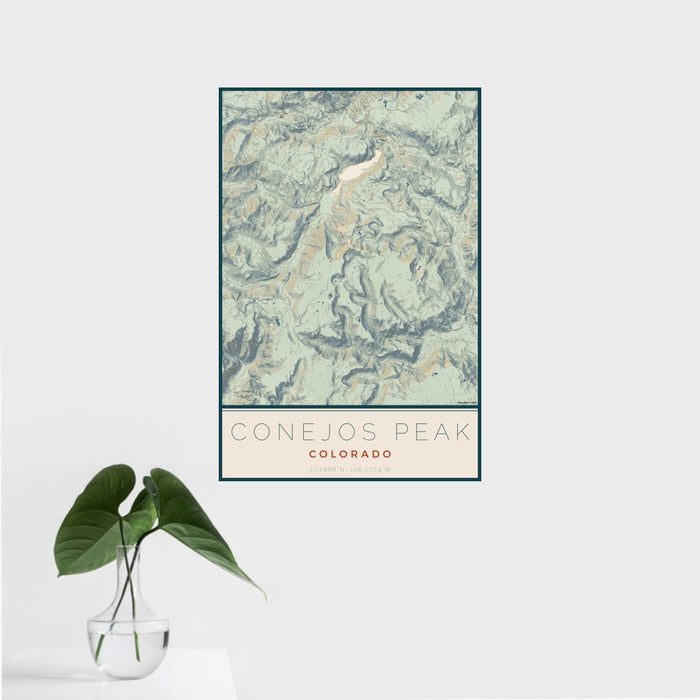 16x24 Conejos Peak Colorado Map Print Portrait Orientation in Woodblock Style With Tropical Plant Leaves in Water