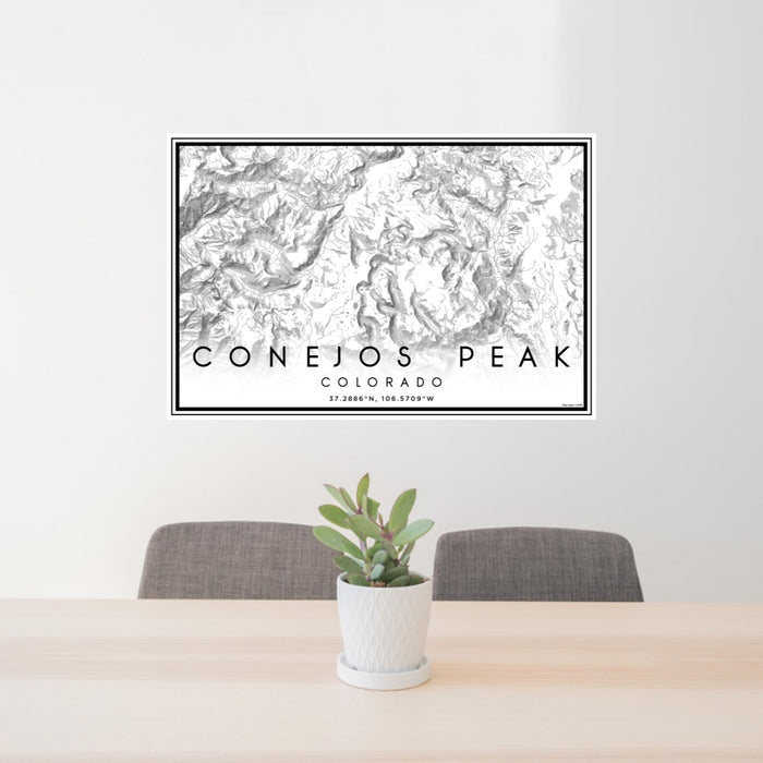 24x36 Conejos Peak Colorado Map Print Lanscape Orientation in Classic Style Behind 2 Chairs Table and Potted Plant