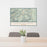 24x36 Conejos Peak Colorado Map Print Lanscape Orientation in Woodblock Style Behind 2 Chairs Table and Potted Plant