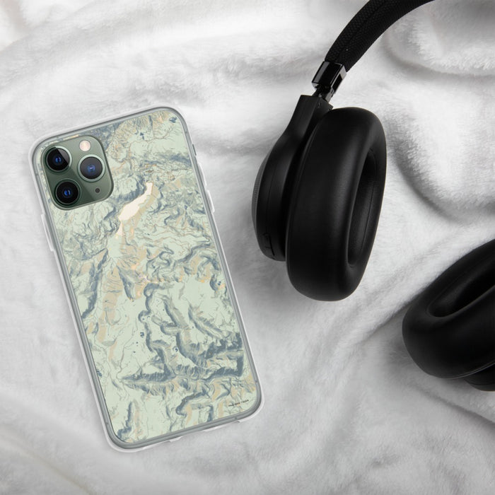 Custom Conejos Peak Colorado Map Phone Case in Woodblock on Table with Black Headphones