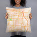 Person holding 18x18 Custom Conway Arkansas Map Throw Pillow in Watercolor