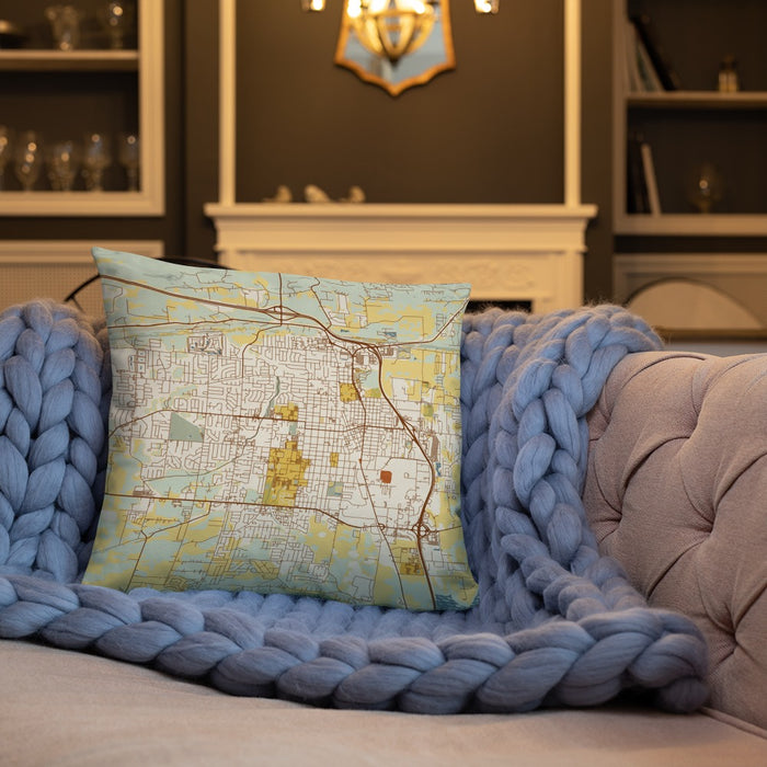 Custom Conway Arkansas Map Throw Pillow in Woodblock on Cream Colored Couch