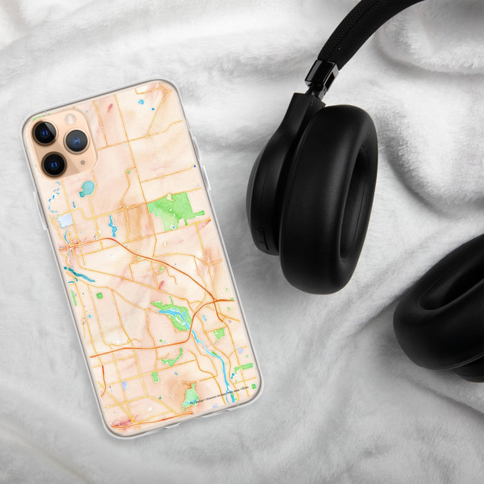 Custom Coon Rapids Minnesota Map Phone Case in Watercolor on Table with Black Headphones