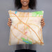Person holding 18x18 Custom Coon Rapids Minnesota Map Throw Pillow in Watercolor