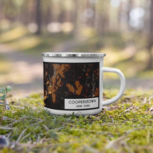 Right View Custom Cooperstown New York Map Enamel Mug in Ember on Grass With Trees in Background