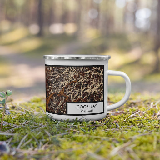 Right View Custom Coos Bay Oregon Map Enamel Mug in Ember on Grass With Trees in Background
