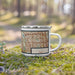 Right View Custom Coppell Texas Map Enamel Mug in Woodblock on Grass With Trees in Background