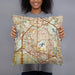 Person holding 18x18 Custom Coppell Texas Map Throw Pillow in Woodblock