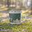 Right View Custom Cormorant Lake Manitoba Map Enamel Mug in Afternoon on Grass With Trees in Background