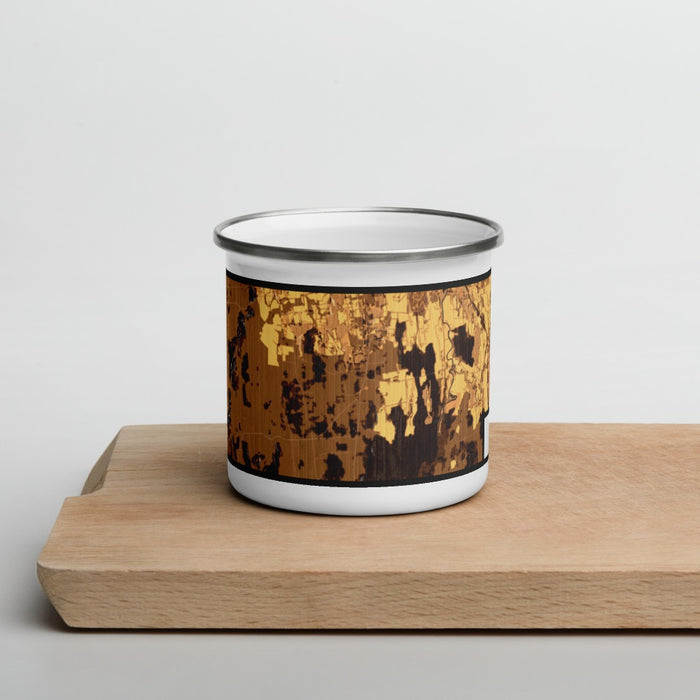 Front View Custom Cornwall Vermont Map Enamel Mug in Ember on Cutting Board