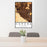 24x36 Corona California Map Print Portrait Orientation in Ember Style Behind 2 Chairs Table and Potted Plant