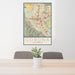 24x36 Corona California Map Print Portrait Orientation in Woodblock Style Behind 2 Chairs Table and Potted Plant