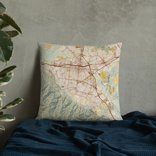 Custom Corona California Map Throw Pillow in Woodblock on Bedding Against Wall