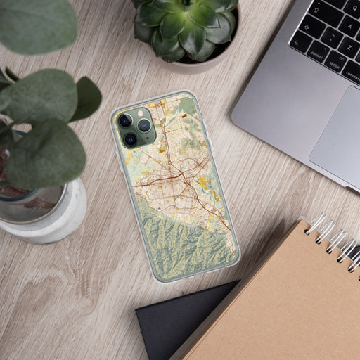 Custom Corona California Map Phone Case in Woodblock on Table with Laptop and Plant