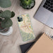 Custom Corona California Map Phone Case in Woodblock on Table with Laptop and Plant