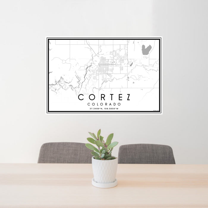 24x36 Cortez Colorado Map Print Lanscape Orientation in Classic Style Behind 2 Chairs Table and Potted Plant