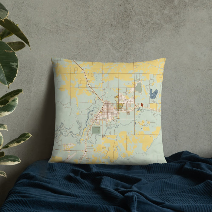 Custom Cortez Colorado Map Throw Pillow in Woodblock on Bedding Against Wall